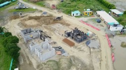 Les structures auxiliaires qui entourent le temple seront peintes dans les couleurs vives typiques des bâtiments de la région.