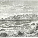 Dessin d’un livre publié dans les années 1880 représentant Acre depuis une plage à l’ouest de la ville. La porte de la mer est près du bord gauche de la digue. (Source : W.M. Thompson, “The Land and the Book”)